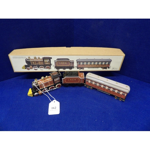 162 - A tin plate model locomotive tender and carriage