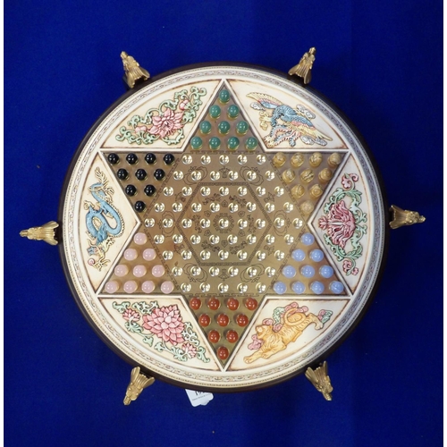 191 - A highly ornate solitaire board game modelled in the oriental style