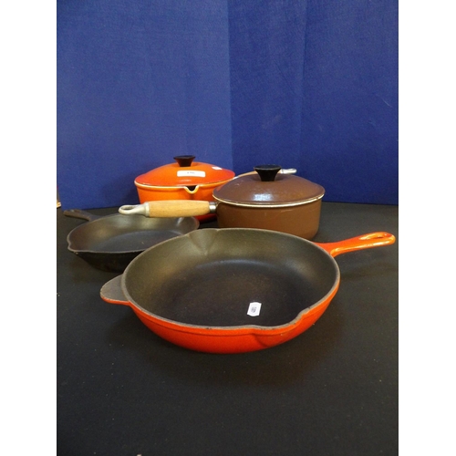 196 - Three pieces of Le Creuset cast iron cookware together with one other