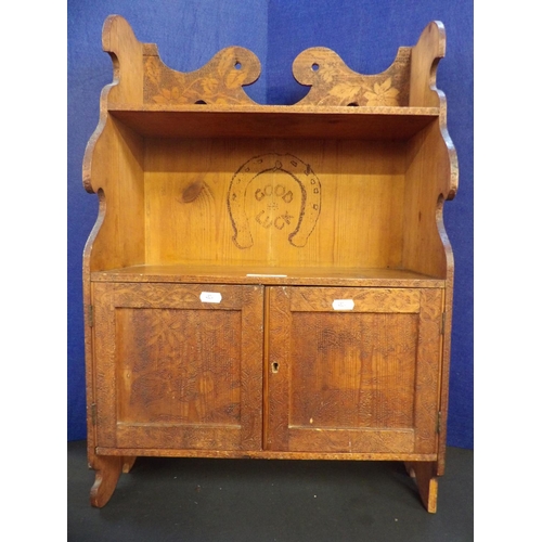 198 - A vintage wall cabinet fitted two shelves above two doors