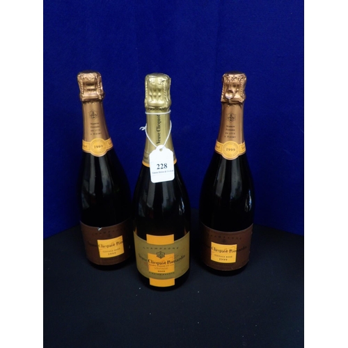 228 - Two bottles of Veuve Clicquot Ponsardin 1999 Vintage Rose Champagne together with a bottle of Veuve ... 