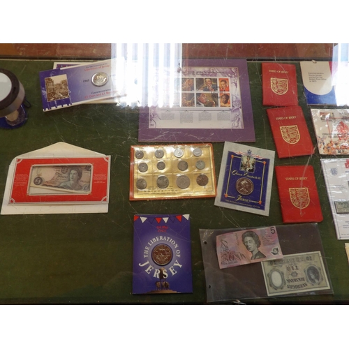 229 - Assorted vintage bank notes and tokens including two vintage States of Jersey one and two shilling n... 