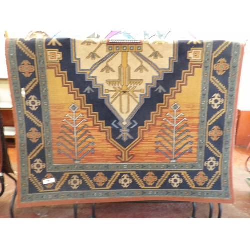 250 - An Eastern style floor rug with geometric decoration (6' x 8')