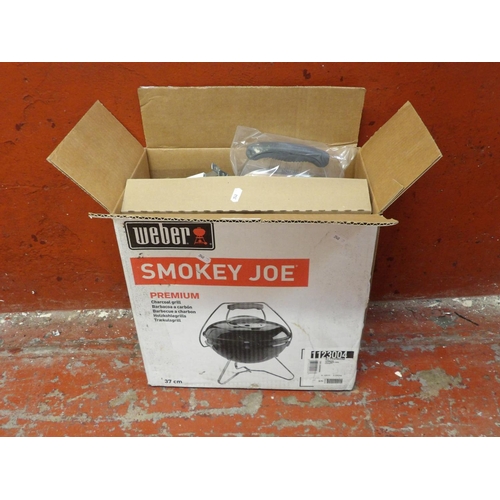 279 - A Weber Smokey Joe premium charcoal barbeque - new and unused