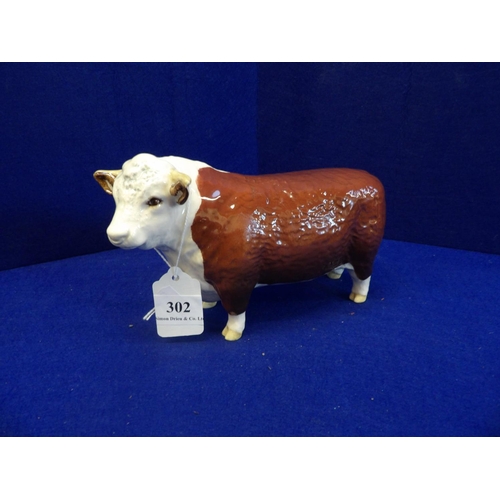 302 - A Beswick model of a Hereford Bull