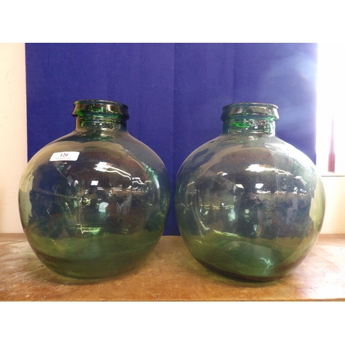 120 - A pair of vintage Viresa green glass acid carboys