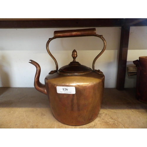 126 - A nineteenth century copper and brass mounted kettle