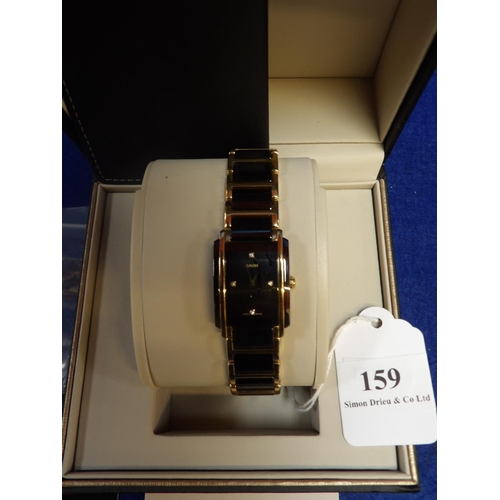 159 - A lady's Rado black and gold jubilee bracelet wrist watch the face set with four diamonds