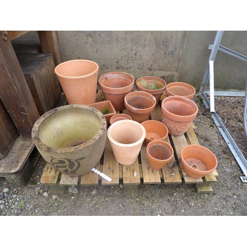 45 - An accumulation of terracotta pots and planters