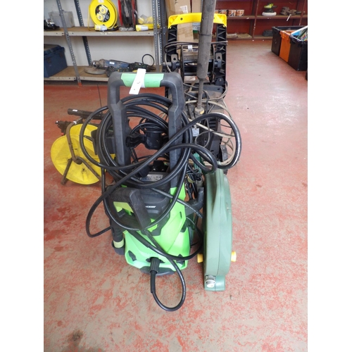 78 - A Paxcess pressure washer together with a lay flat hose reel