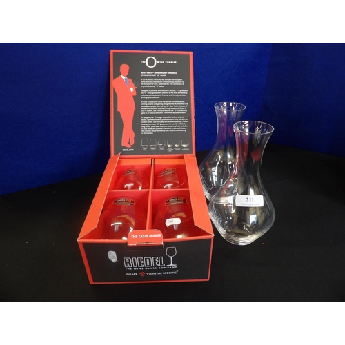 211 - A boxed set of Riedel wine tumblers together with two Riedel carafes