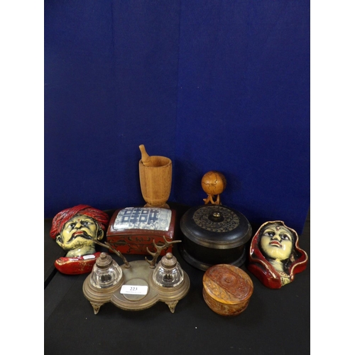 223 - Assorted oriental boxes, a pair of figural wall sconces, a desk stand etc.