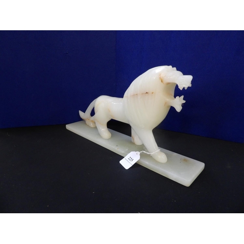 225 - An onyx model of a prowling lion