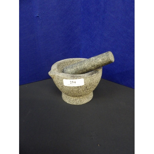 254 - A granite mortar and pestle