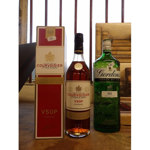 302 - A presentation bottle of Courvoisier VSOP Cognac together with a 1L bottle of Gordon's London Dry Gi... 