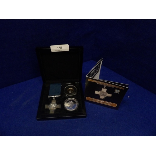 338 - The George Cross gold and silver proof set