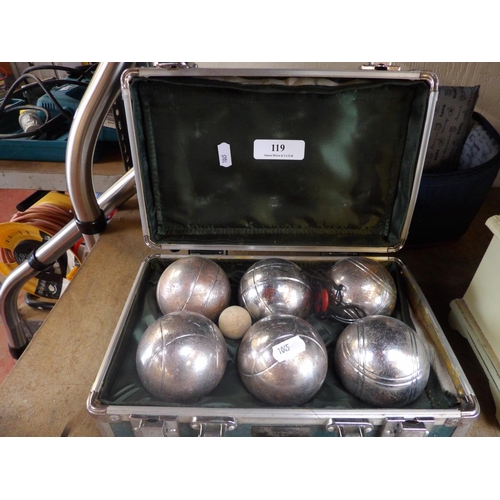 119 - A cased set of boules together with one other