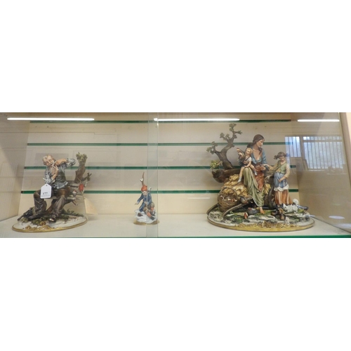 177 - A Capodimonte group ornament together with two other figural ornaments