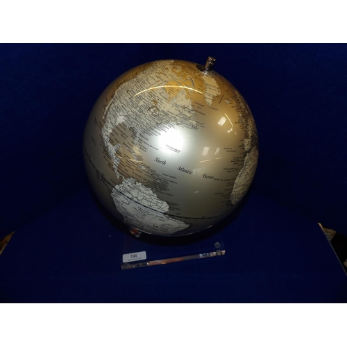 241 - A silvered desk globe of the world mounted upon an acrylic plinth