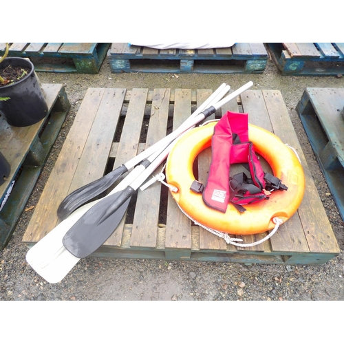 78 - Three dinghy paddles, a Crewfit life jacket and a life buoy