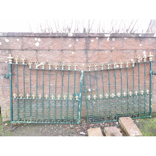 85 - A pair of vintage ornate wrought iron entrance gates - 2.9m span approx