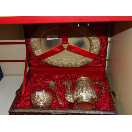 289 - An oriental white metal four piece tea service in fitted case