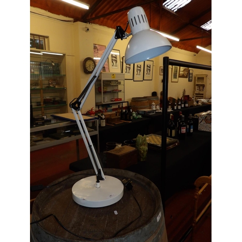 305 - An angle poise desk lamp finished in white