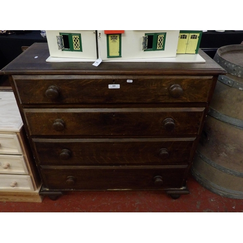 309 - A vintage chest of four long graduated drawers in original grained finish