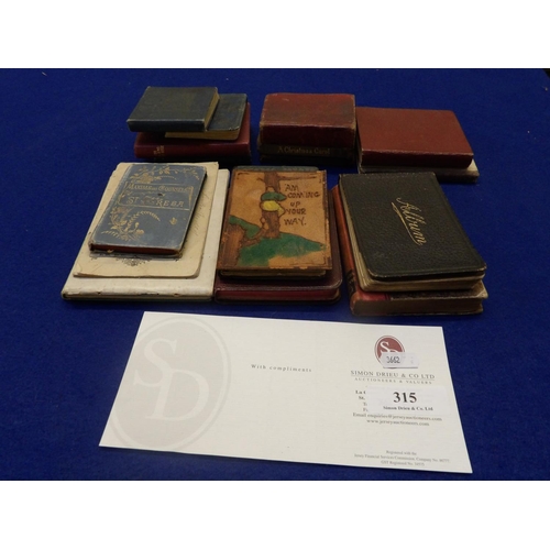 315 - An assortment of books, an autograph album and other ephemera all of diminutive form