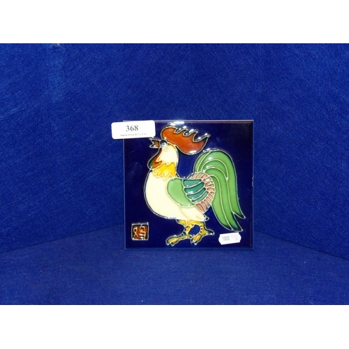 368 - A glazed majolica tile depicting an oriental Cockerel