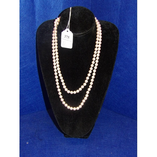 375 - A double strand silk thread pink pearl necklace