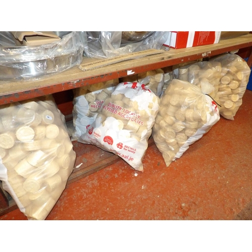 410 - Ten bags of wood briquettes