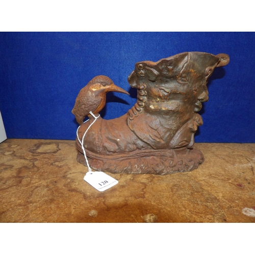 120 - A cast iron door stop modelled in the form of a kingfisher on a hob nail boot