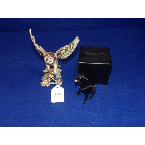 148 - An enamelled owl trinket box with matching necklace together with an enamel trinket box of a black l... 