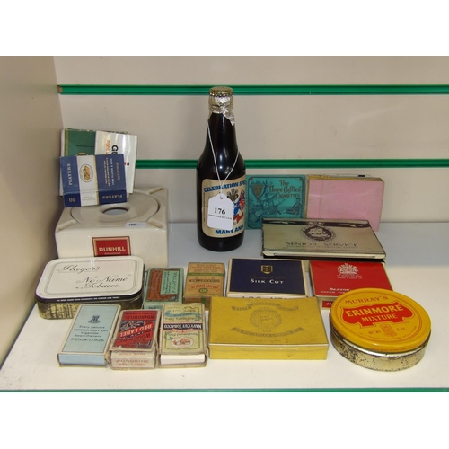 176 - A range of mid century cigarette packets and tins, a Dunhill ceramic ashtray, a bottle of Mary Ann C... 