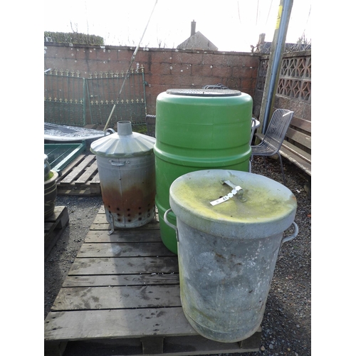 21 - A PVC water butt, a galvanised garden incinerator and a galvanised dustbin