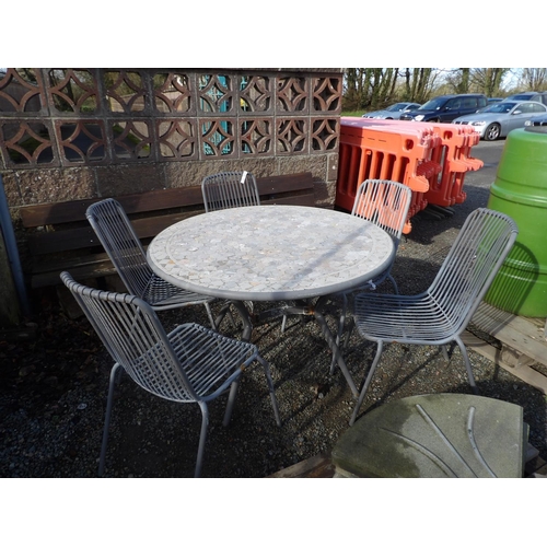 24 - A circular metallic patio table with stone mosaic top and five chairs