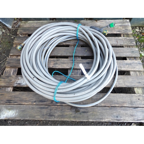 41 - A roll of commercial grade hosepipe complete with fittings