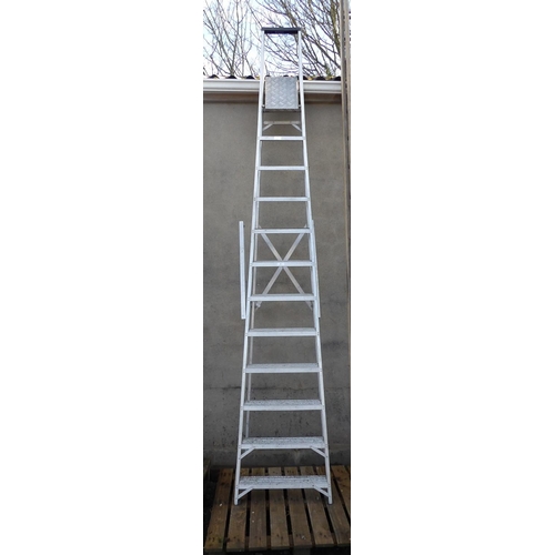 43 - An aluminium twelve tread step ladder