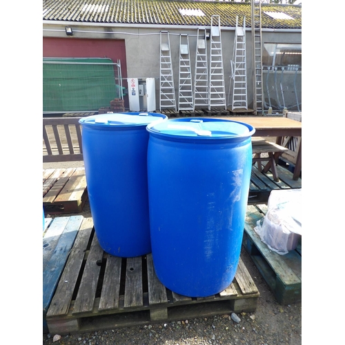 65 - Two blue PVC barrels