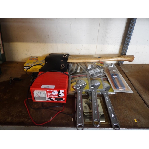 96 - A Gunson battery charger, a socket set, adjustable spanners, an axe and other new tools and accessor... 