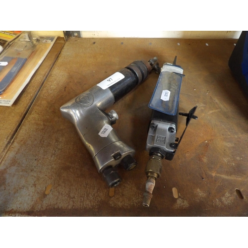 97 - A pneumatic drill together with a pneumatic pad saw
