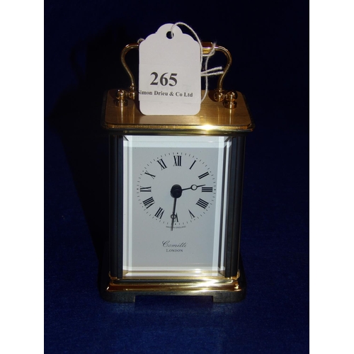 265 - A gold tone carriage clock by Comitti of London