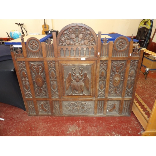 270 - A vintage oak panel with profuse carved decoration