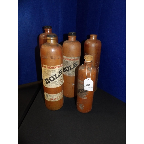 285 - Five vintage Bols salt glazed stoneware gin bottles