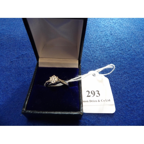 293 - An 18 carat white gold diamond cluster and diamond shank ring - size Q