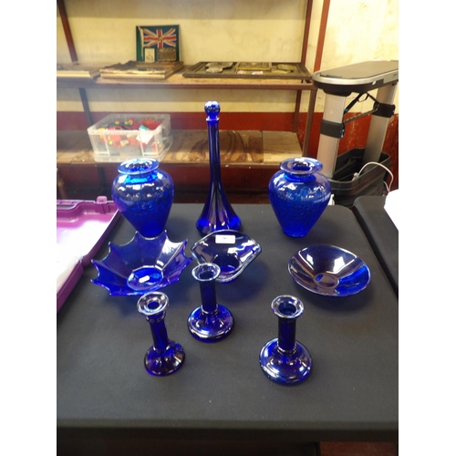 307 - An accumulation of blue glass ware