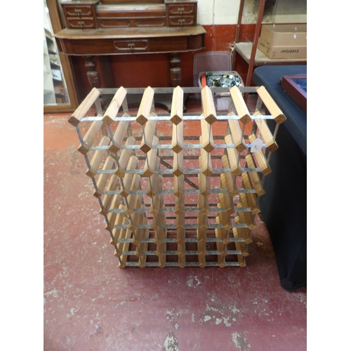 312 - A wooden and metallic wine rack