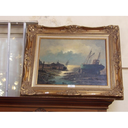 313 - A gilt framed oil depicting fishing boats at low water signed David Short