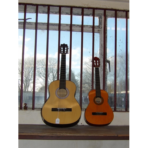 330 - A Viva acoustic guitar together with a Stagg student guitar